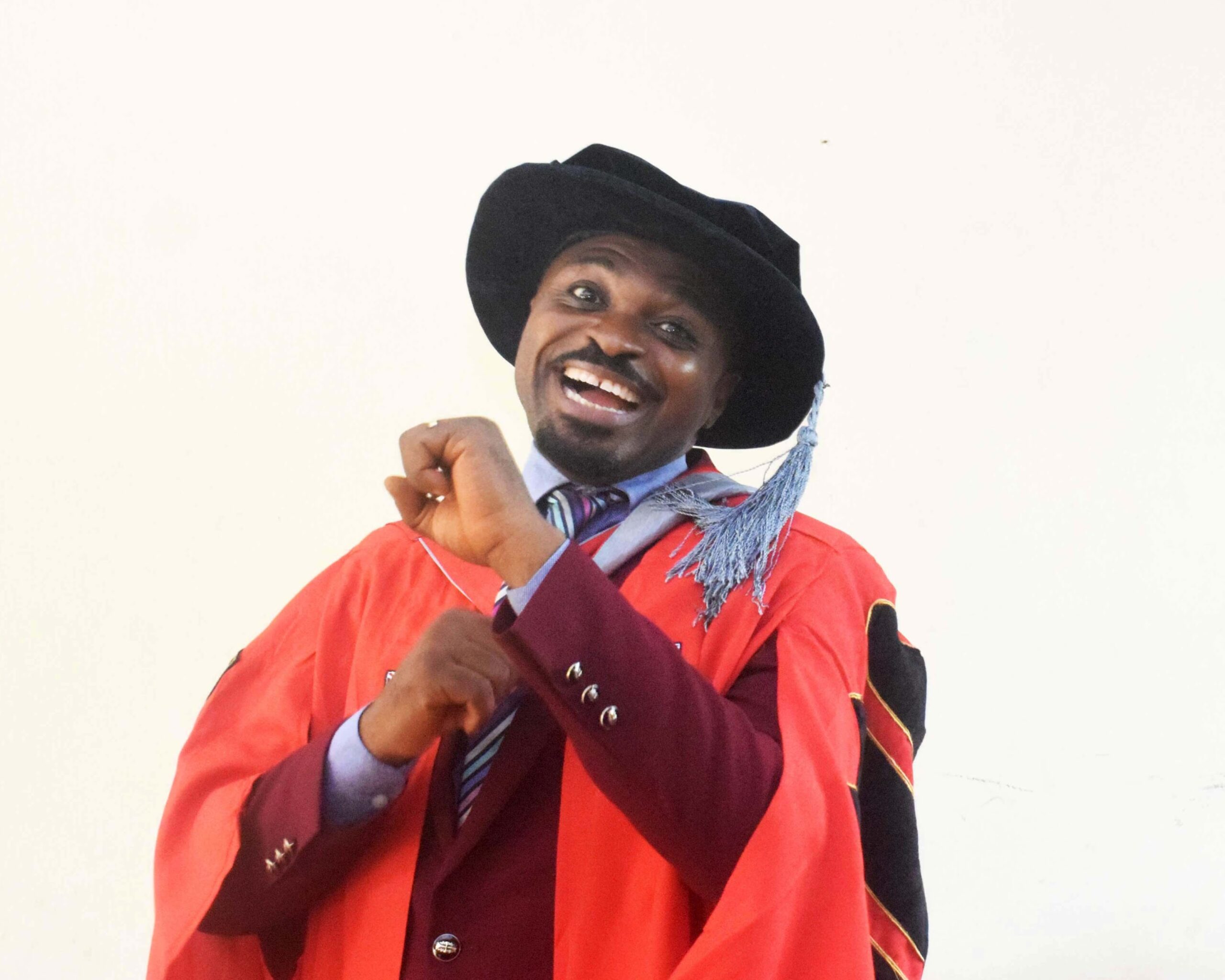 At 50, Dr. Sola Owolabi Uses Books and Faith to Inspire a Generation